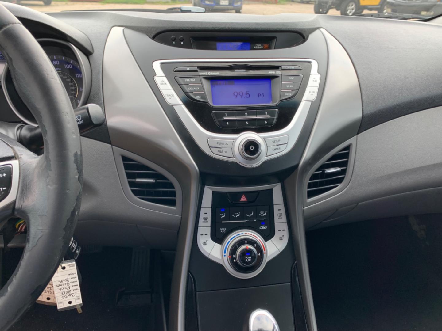 2012 Black Hyundai Elantra GLS A/T (KMHDH4AE3CU) with an 1.8L L4 DOHC 16V engine, Automatic transmission, located at 1830 North Belt Line Road, Irving, TX, 75061, (469) 524-0199, 32.834373, -96.993584 - Photo#13